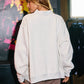 NASH |  Embroidered Mock Neck Sweatshirt