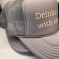 Drinks well with others Trucker Hat